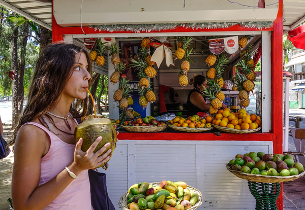 Drinking coconut water in Mauritius